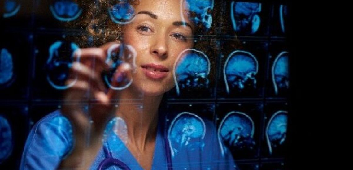 female-radiologist-resized web Woman viewing medical imaging