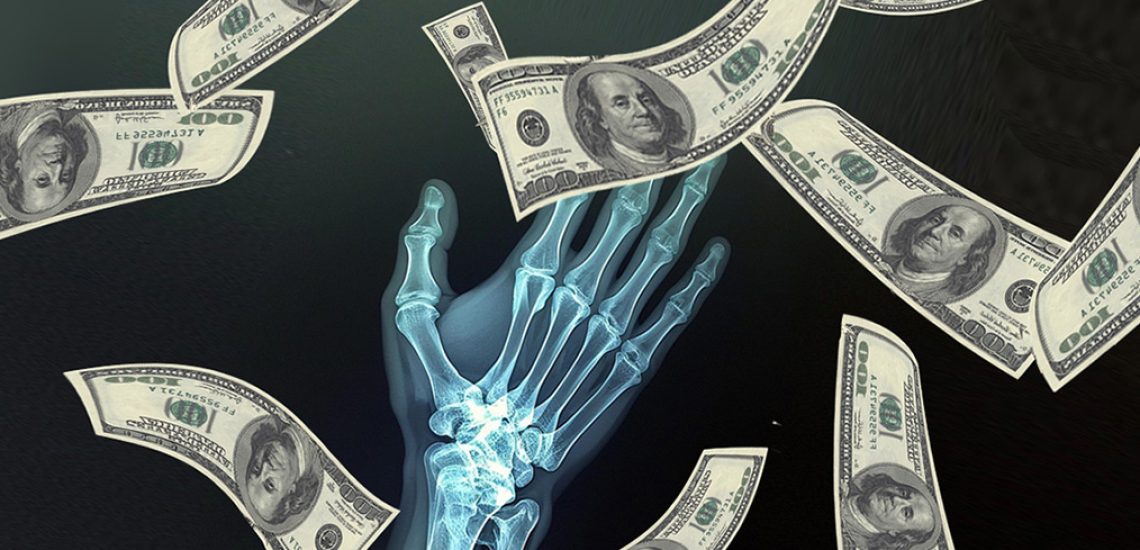 radiologybusinessmoneyhand XRAY image with floating money to illustrate radiology business